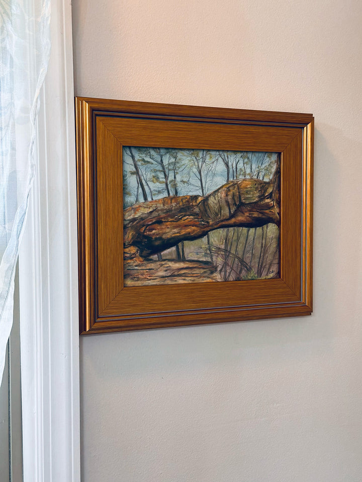 A painting of Princess Arch from Red River Gorge, Kentucky is displayed in this lovely gold plein air frame.