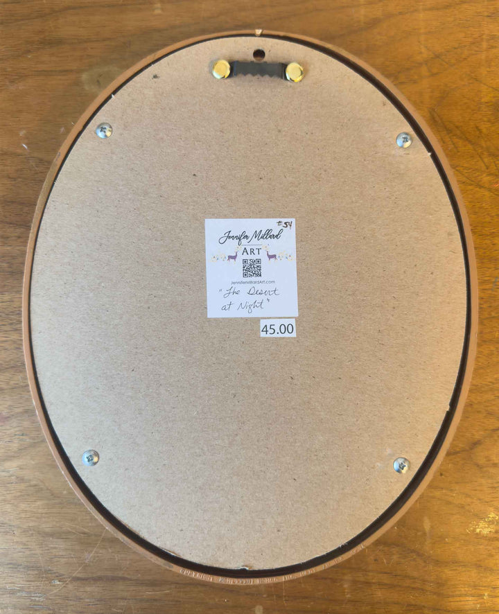 The back of this vintage oval frame has a sawtooth hanger for immediate hanging on a wall.