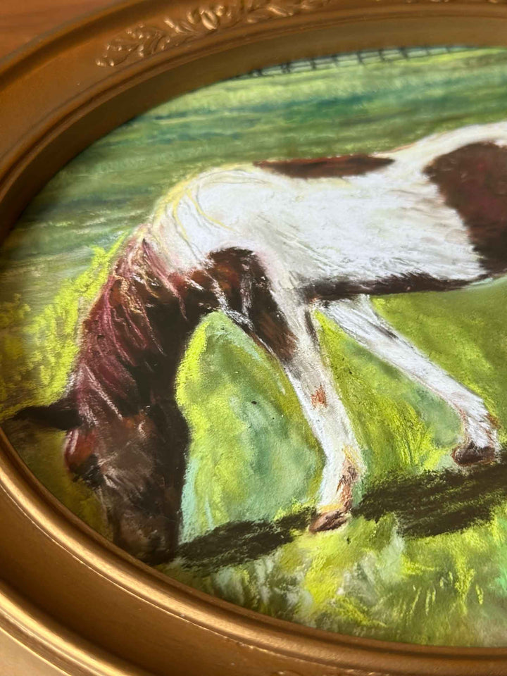 An up-close view of this pretty brown and white horse in early spring, under glass in a vintage oval frame.